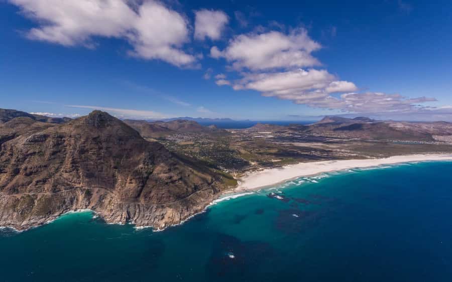 Cape Town: 2 Oceans Helicopter Flight with Boat Tour Ticket - Over Hout Bay, Then the Peninsula Cross: Aerial Clues of the Two Oceans