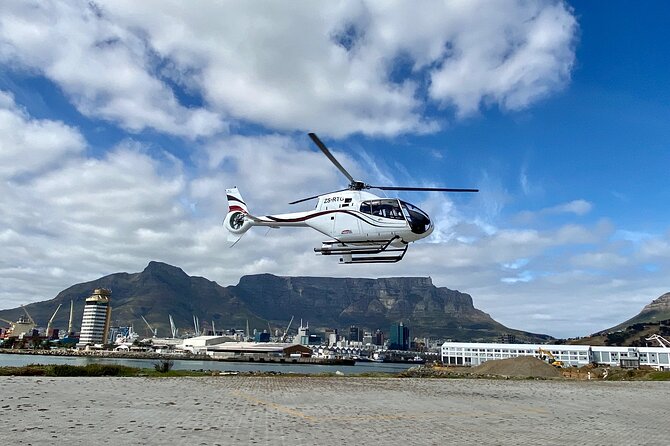 Cape Town: 25min Helicopter Flight with Complimentary Boat Cruise - Entering the V&A Waterfront, then lifting off fast