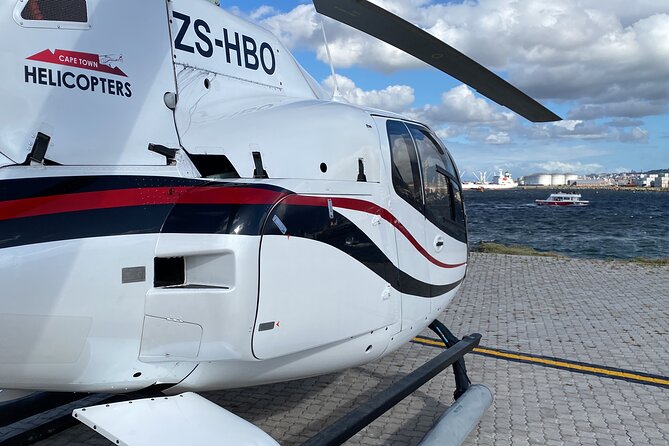 Cape Town: 25min Helicopter Flight with Complimentary Boat Cruise - Muizenberg shark watch and the terrain shift