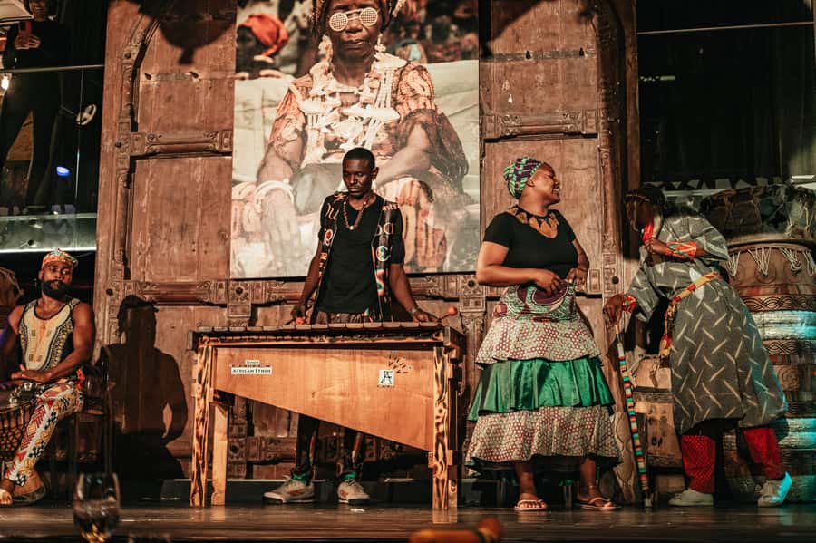 Cape Town: African Dinner, Drumming Experience with Transfer - Entertainment Up Close: Mali Puppets, Singing, Drumming, and Face Painting