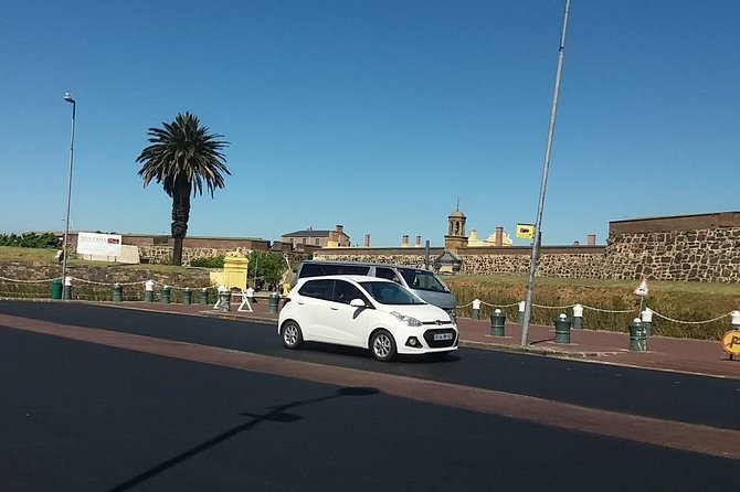 Cape Town City Tour Camps Bay Beach Plus Table Mountain Ticket - District Six Museum, slavery context, and when to budget extra