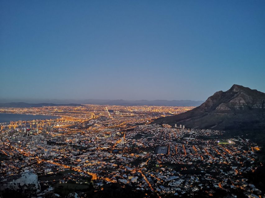 Cape Town: Lion's Head Guided Hike at Sunset - Watching Cape Town light up during the descent