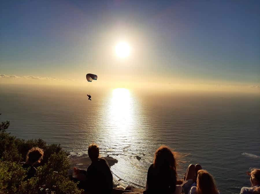 Cape Town: Lion's Head Sunrise with coffee or Sunset Hike - Reaching the summit: your 360 view, plus the iconic rock photo timing