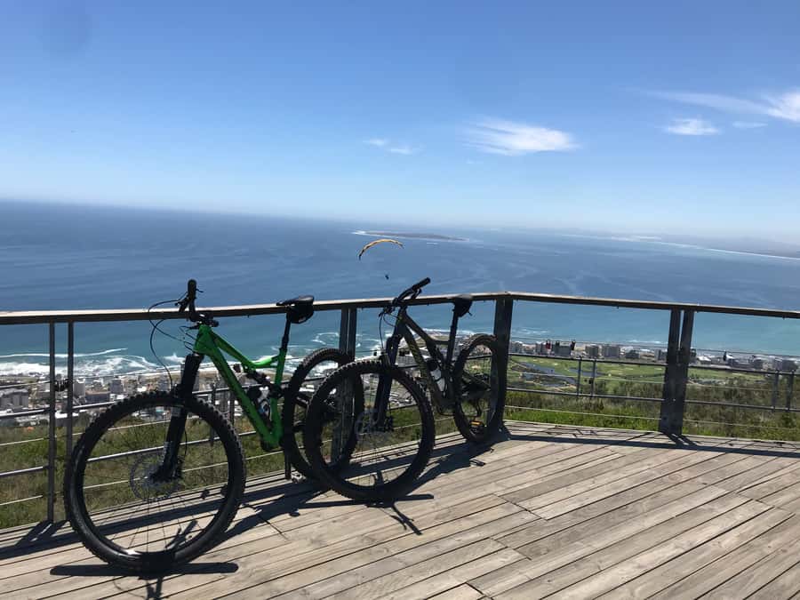 Cape Town: Mountain Biking Trip along Table Mountain - Camps Bay finish: coffee, shade, and a clean landing