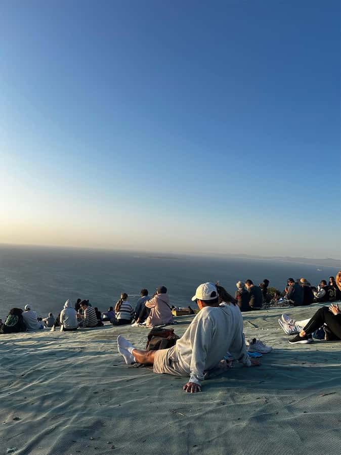 Cape Town: Sunset Bus Tour with Picnic on Signal Hill - Signal Hill golden hour: how to enjoy the picnic stop