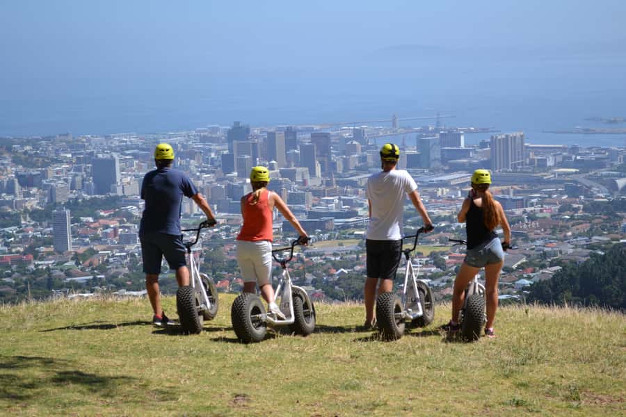 Cape Town: Table Mountain Gravity Scooter Tour - Start at Kloof Nek, Then Up to Signal Hill by Safari Vehicle