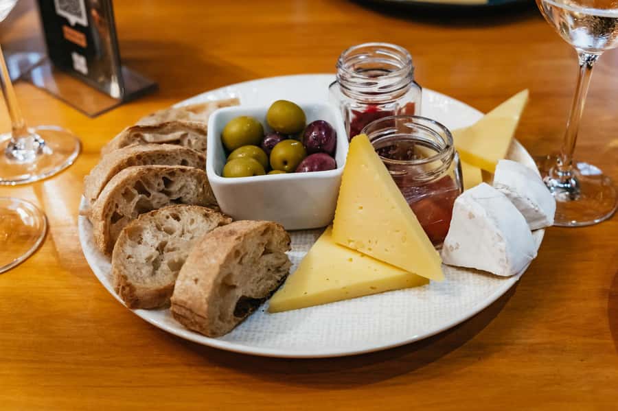 From Cape Town: 3 Regions Wine Tour with 3 Estates, 15 Wines - Stellenbosch morning: cellar tour, cheeses, and a guided town walk