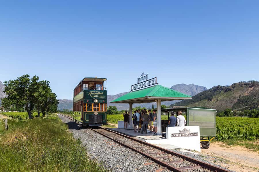 From Cape Town: Franschhoek Wine Tram Hop-on Hop-off - A Day Rolling Through the Cape Winelands by Tram and Bus