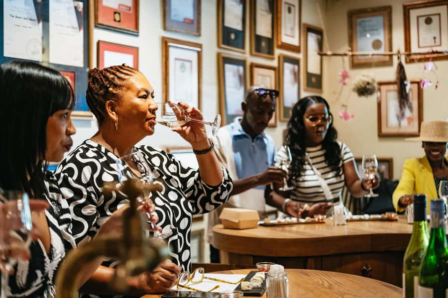 From Cape Town: Full Day Winelands Tour with wine tastings - Franschhoek: French Huguenot roots, lunch time, and a real walk