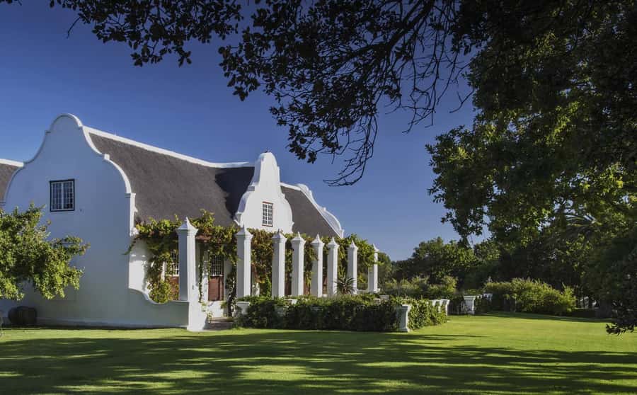 From Cape Town: Stellenbosch Four Estate Full-Day Wine Tour - Cheese, Cured Meats, and Fair Trade Chocolate Pairings