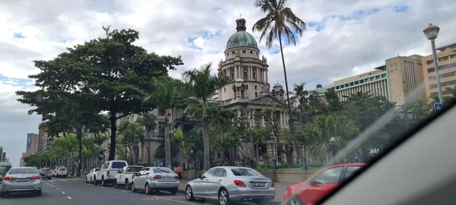 From Durban: Half Day Durban City Tour - Golden Mile, City Hall, and harbor views from the bus
