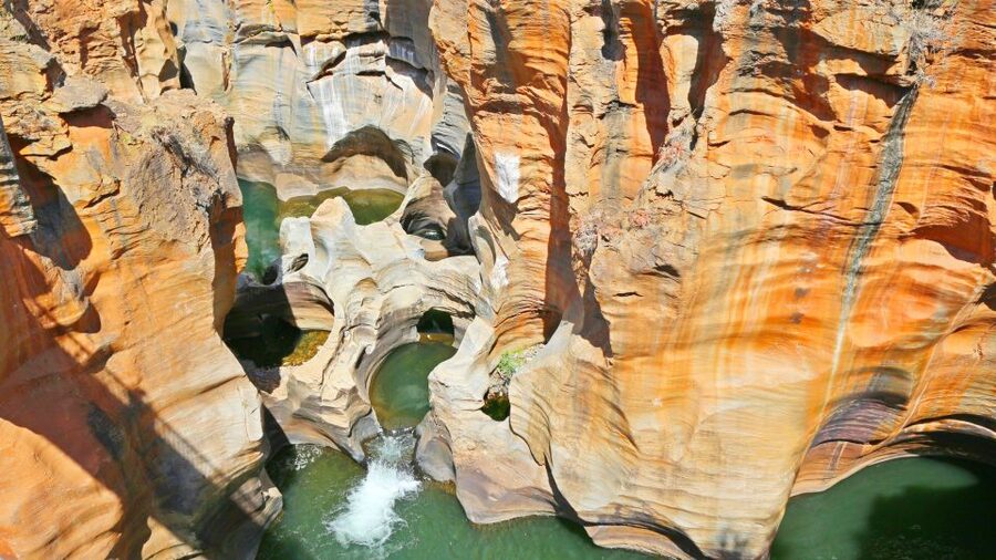 From Hazyview: Blyde River Canyon Highlight & Boat Cruise - Swadini Aventura boat cruise: the shift from rock to living river