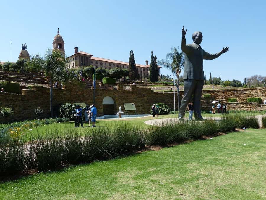 From South Africa Joburg: Pretoria City Half Day Tour - Pickup, coach rides, and the small-group comfort factor