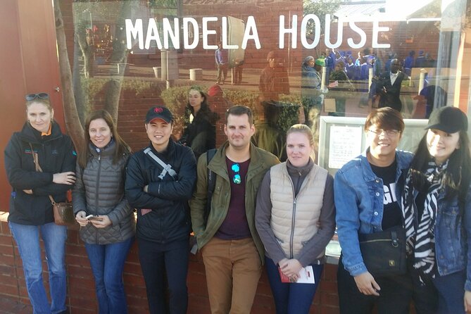 Half Guided Day Tour of Soweto And Apartheid Museum - Walking through Soweto highlights, from Orlando Tower to Freedom Square
