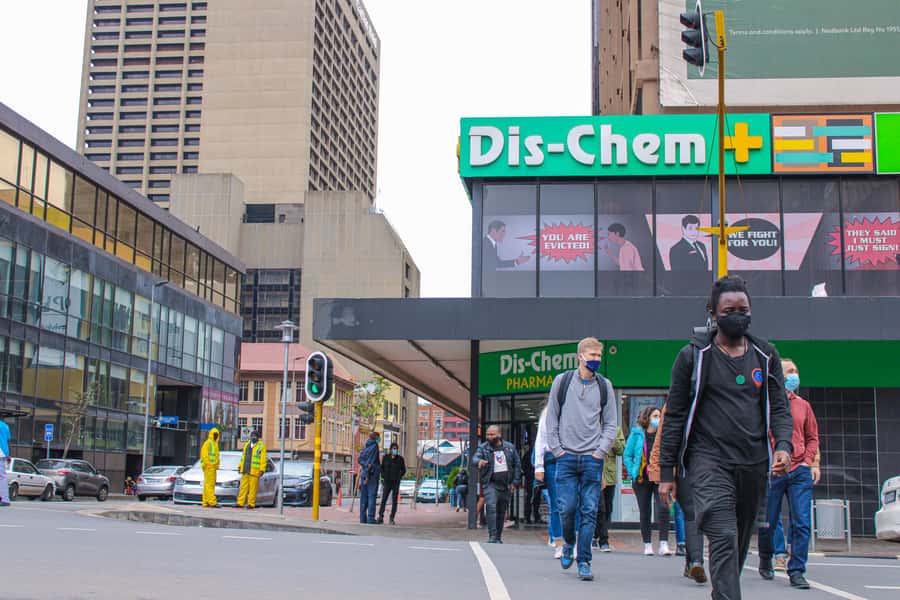 Johannesburg: Hillbrow Walking Tour Including Ponte building - Entering the day: pickup, welcome drink, and lunch