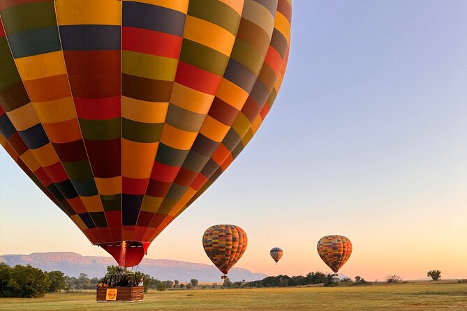 Johannesburg: Hot Air Balloon Flight along Magalies Valley - Check-in at Clubhouse Pavilion: coffee, mini muffins, and the balloon glow