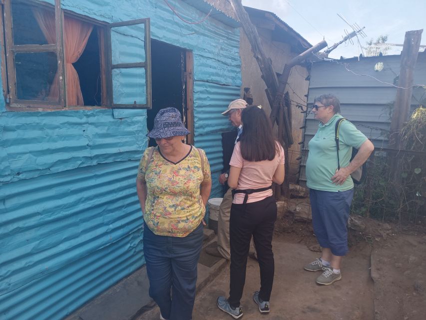 Johannesburg: Soweto History Tour with Hotel Pickup - Lunch at Samkunzi or Chap Pozi, and Why That Helps