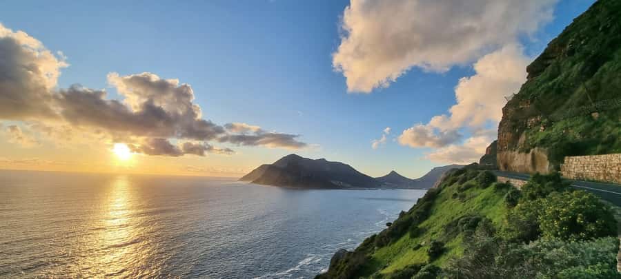 Luxury Cape of Good Hope & Penguin Tour - Hout Bay photo stop: a coastal contrast before the final cape moment