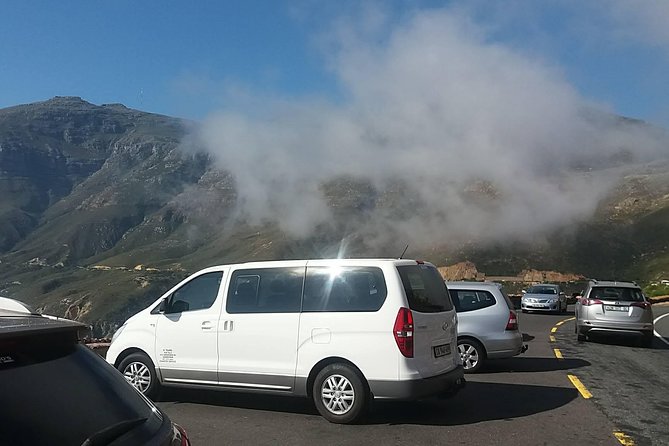 Private Cape Point Penguins Tour-Exploring the Cape Peninsula F/D - Muizenberg Beach: Surf Energy, Shark Spotter Boards, and Sun-Wise Walking