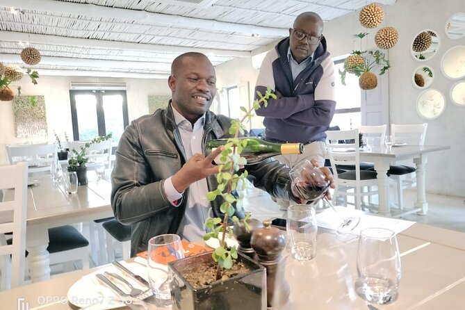 Table Mountain & Constantia Wine Tasting Full Day Tour. - The route to Constantia: from city landmarks to wine valley
