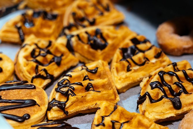The 10 Tastings of Cape Town With Locals: Private Food Walking Tour - Company’s Gardens comfort food: koeksister and biltong with room to breathe